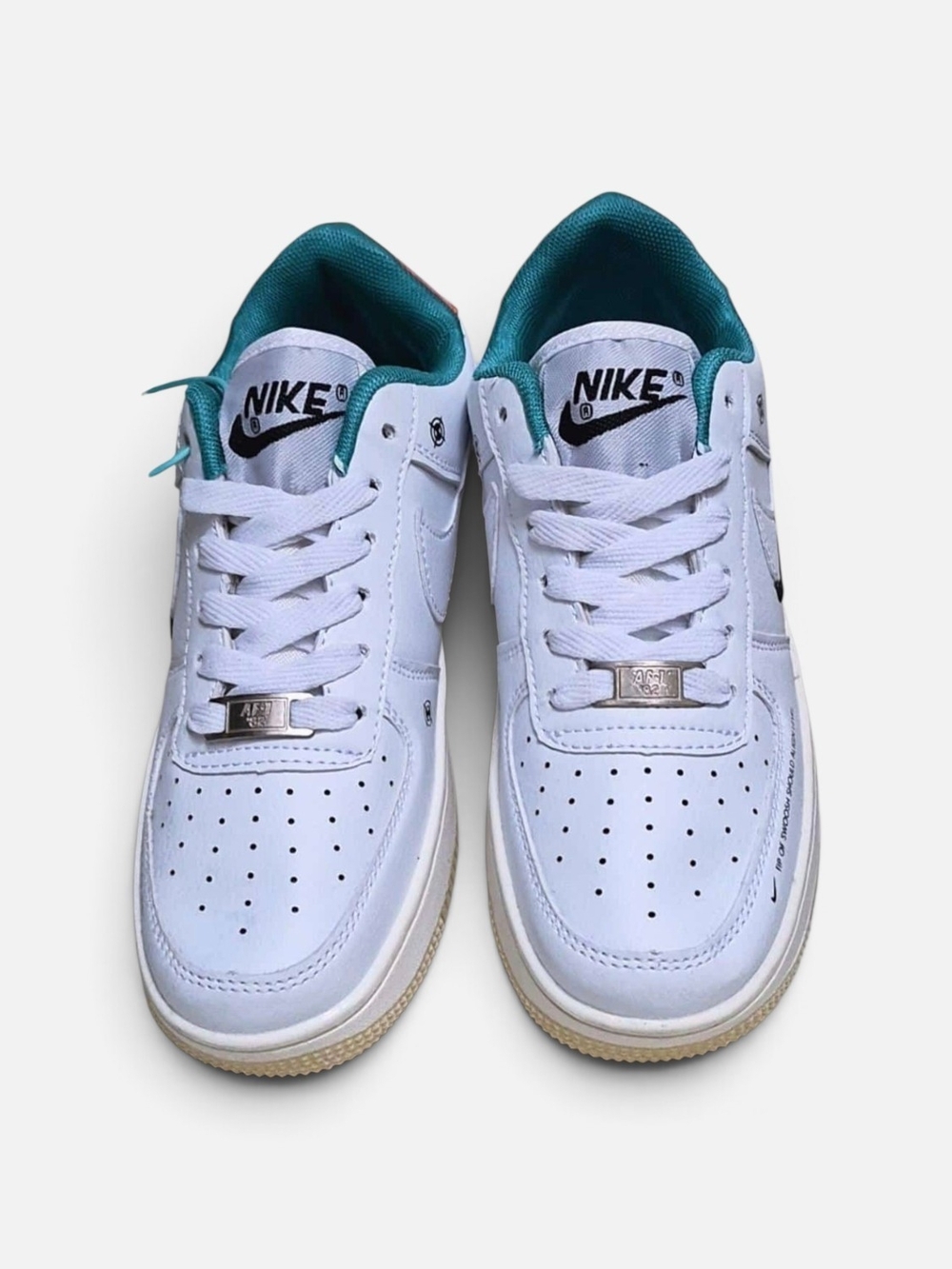 Nike Kids' White Low-Top Sneakers with Teal Lining